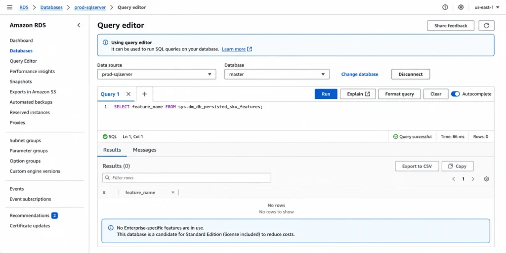 AWS RDS SQL Server Query Editor showing the result of SELECT feature_name FROM sys.dm_db_persisted_sku_features returning zero rows, confirming no Enterprise edition-specific features are persisted in the database and it qualifies as a Standard Edition downgrade candidate.